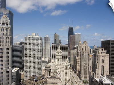 Skyscrapers in a city, Wrigley Building, Magnificent Mile, Upper Michigan Avenue, Michigan Avenue, Chicago, Illinois,