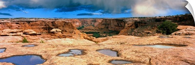 Slickrock waterpocket pools, Canyon De Chelly National Monument, Arizona