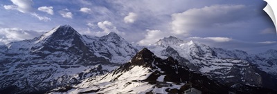 Snow covered mountains Mt Eiger Mt Monch Mt Jungfrau Mt Tschuggen Mt Mannlichen Grindelwald Bernese Oberland Switzerland
