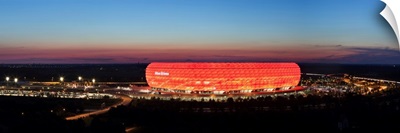 Soccer stadium lit up at dusk, Allianz Arena, Munich, Bavaria, Germany