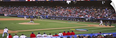 Spectators watching baseball game in a baseball stadium, Japan vs. United States, World Baseball Classic, Angel Stadium, Anaheim, California