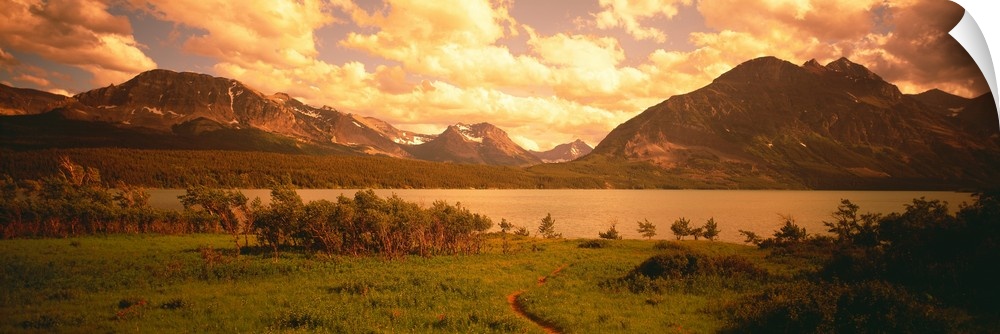 Sunset over the Rocky Mountains at Saint Mary Lake in Glacier Nation Park, Montana.