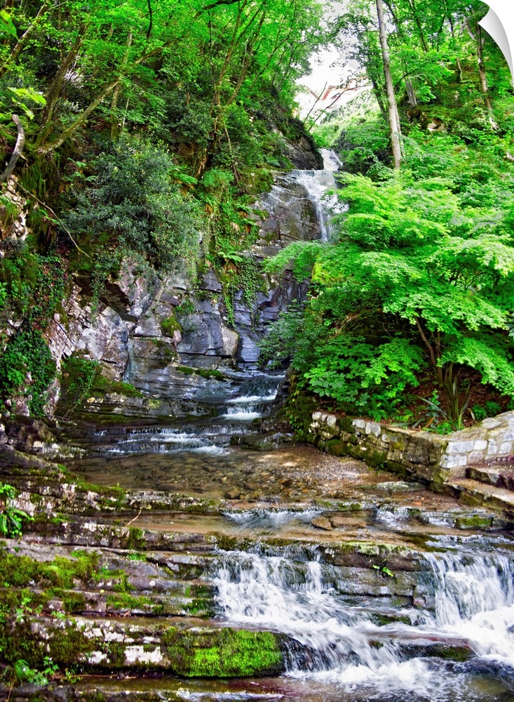 Stream flowing through rocks, Villa Pliniana, Torno, Lake Como, Lombardy, Italy