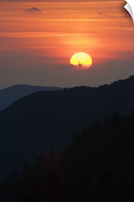 Sun setting behind clouds, silhouetted mountains, Great Smoky Mountains National Park, Tennessee