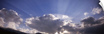 Sunbeams radiating through clouds, Paro, Bhutan