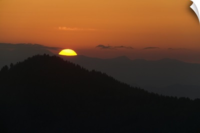 Sunrise over back lit hazy mountain ridges, Blue Ridge Parkway, North Carolina