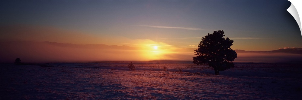 Sunset over a snow covered landscape, Lewis and Clark County, Montana