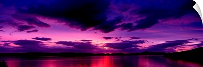 Sunset over an island viewed from Applecross Peninsula Isle of Skye Inner Hebrides Hebrides Scotland