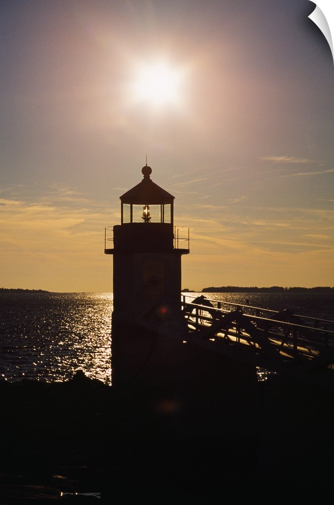 Sunstar Over Silhouetted Marshall Point Lighthouse