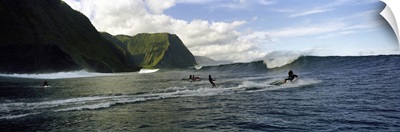 Surfers in the sea, Hawaii,