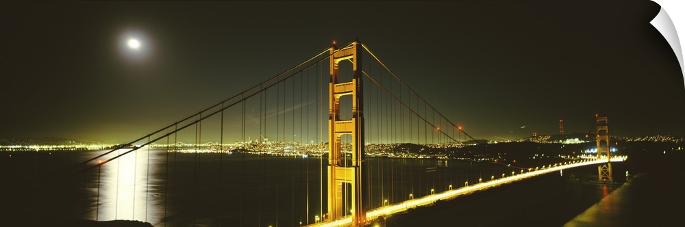 Giant panoramic photograph of the Golden Gate Bridge at night, the moonlight reflecting in the waters of the San Francisco...