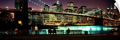 Suspension bridge lit up at dusk, Brooklyn Bridge, East River, Manhattan, New York City, New York State