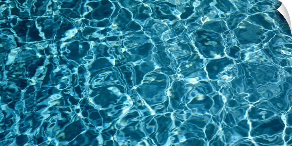 Panoramic photograph of water reflected in the bottom of a pool.