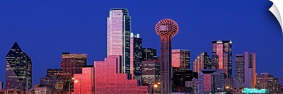 Texas, Dallas, Panoramic view of an urban skyline at night