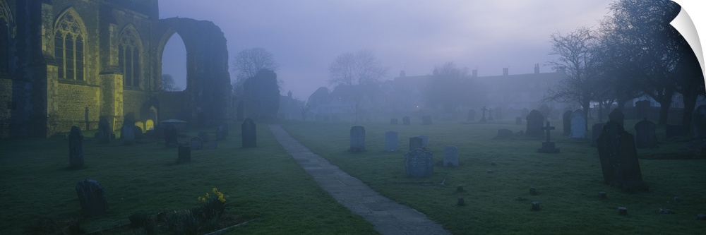 Tombstones in a cemetery, Winchelsea, East Sussex, England