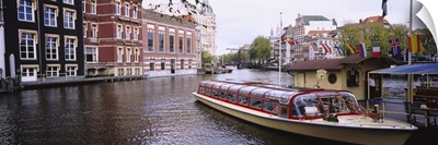 Tourboat in a channel, Amsterdam, Netherlands