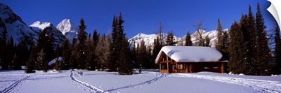 Tourist lodge in a snow covered field, Naiset Cabins and Huts, Mt Assiniboine Provincial Park, British Columbia, Canada