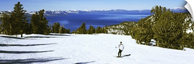 Tourist skiing Heavenly Mountain Resort, Lake Tahoe, California-Nevada Border