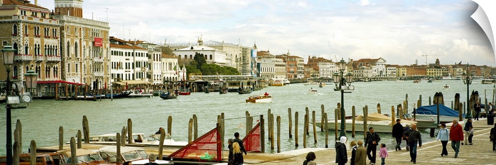 Tourists walking along a canal, Grand Canal, Fondamenta Della Dogana Alla Salute, Dorsoduro, Venice, Veneto, Italy