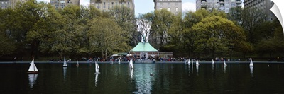 Toy boats floating on water, Central Park, Manhattan, New York City, New York State