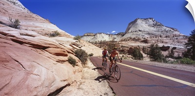 Two people cycling on the road Zion National Park Utah