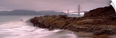 Waves breaking on rocks, Golden Gate Bridge, Baker Beach, San Francisco, California