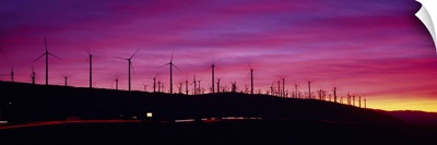 Wind turbines in a row at dusk, Palm Springs, California