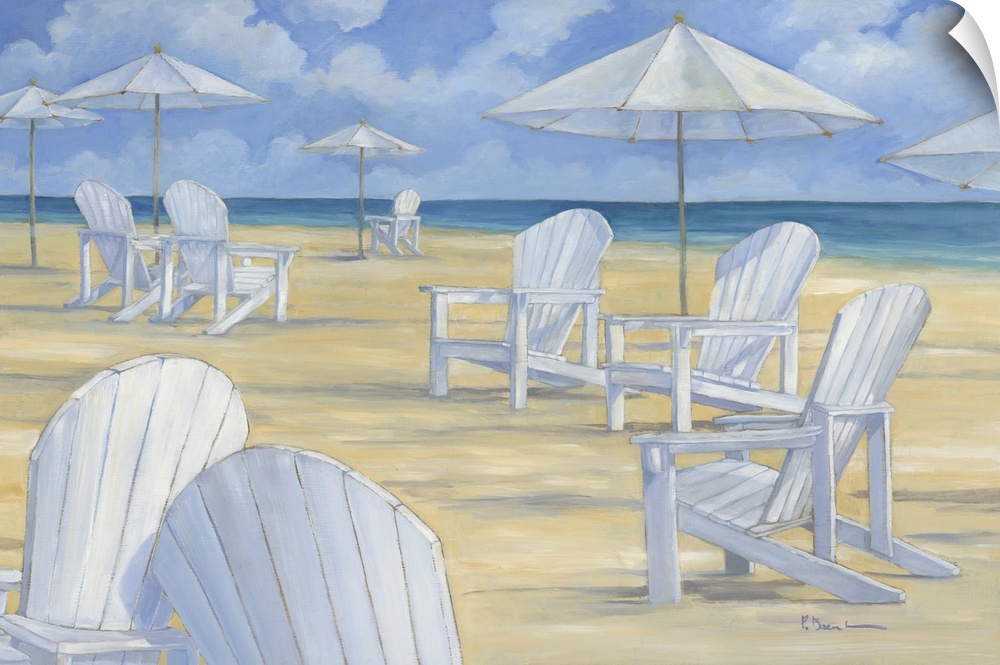 Beach chairs and umbrellas on a sandy beach.