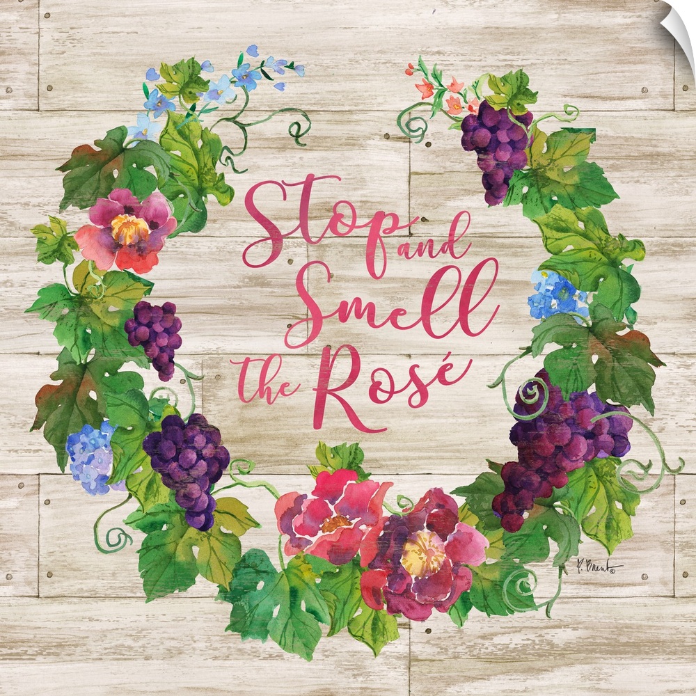 "Stop and Smell the Rose" written in the center of a floral wreath with grapes on a faux wood background.