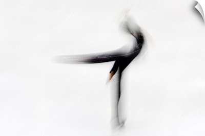 Blurred action of figure skater