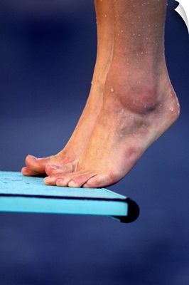 Detail of diver's feet on the diving board