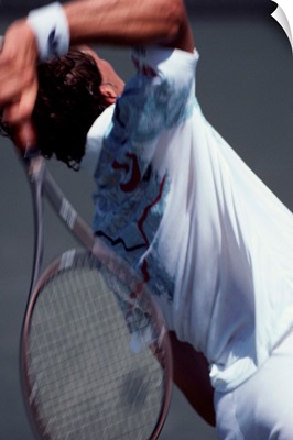 Detail of male tennis player serving