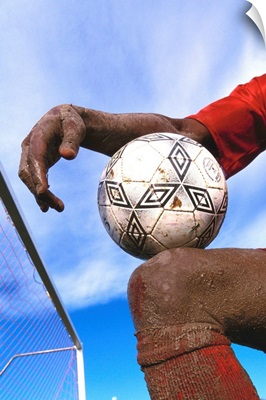 Detail of soccer player and ball
