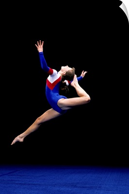 Female gymnast performing on the floor exercise