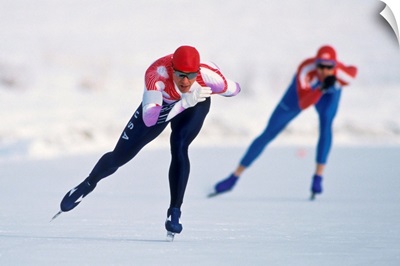 Female speed skaters in action
