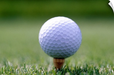 Golf ball sitting on a tee