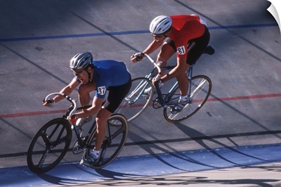 Male cyclists competing on the velodrome