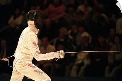 Male fencer in action