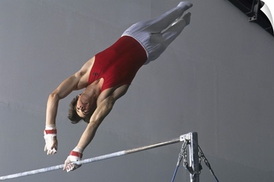 Male gymnast on the horizontal bar