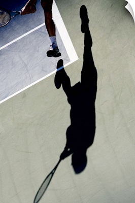 Shadow of tennis player in action