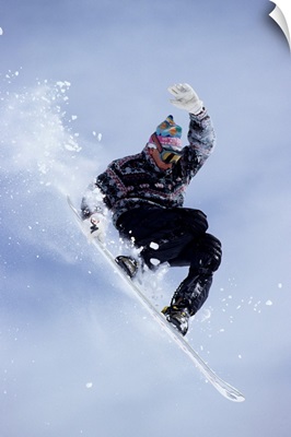 Snowboarder flying through the air