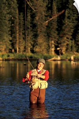 Woman fly fishing