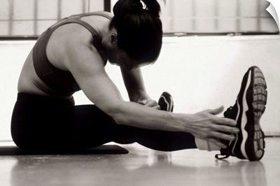 Woman stretching during a workout