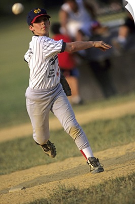 Young boy pitching