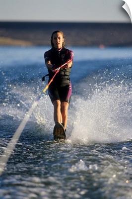 Young female water skier in action