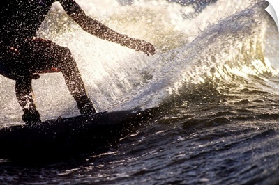 Young male water skier in action