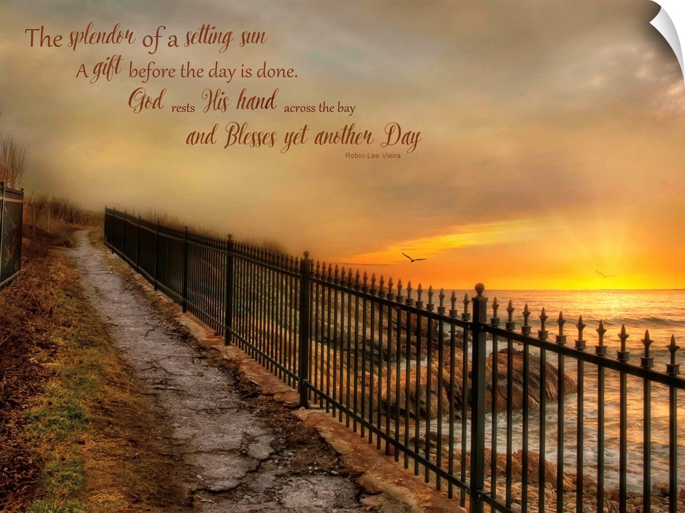 A walkway with an iron fence along the coast, with a bible verse.