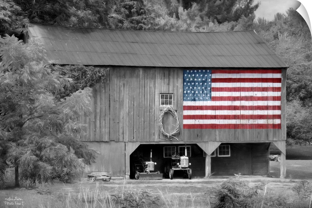 Black and white photo of a barn with an American Flag in color painted on the side.