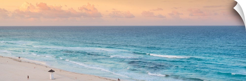 Panoramic aerial photograph of the ocean in Cancun, Mexico at sunset. From the Viva Mexico Panoramic Collection.