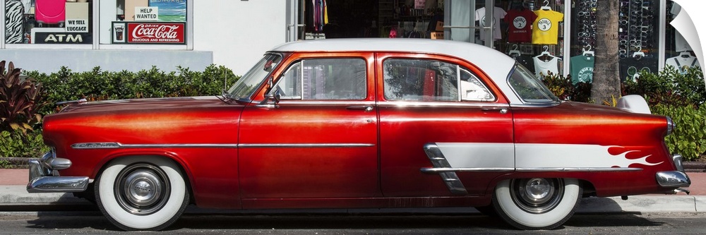 A bright red vintage car in Miami, Florida.